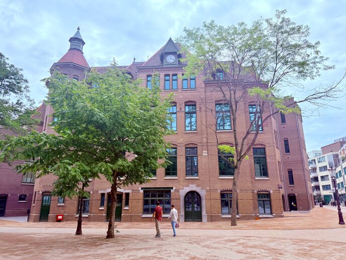 To enter the building, you need your physical student card to pass through the gates.